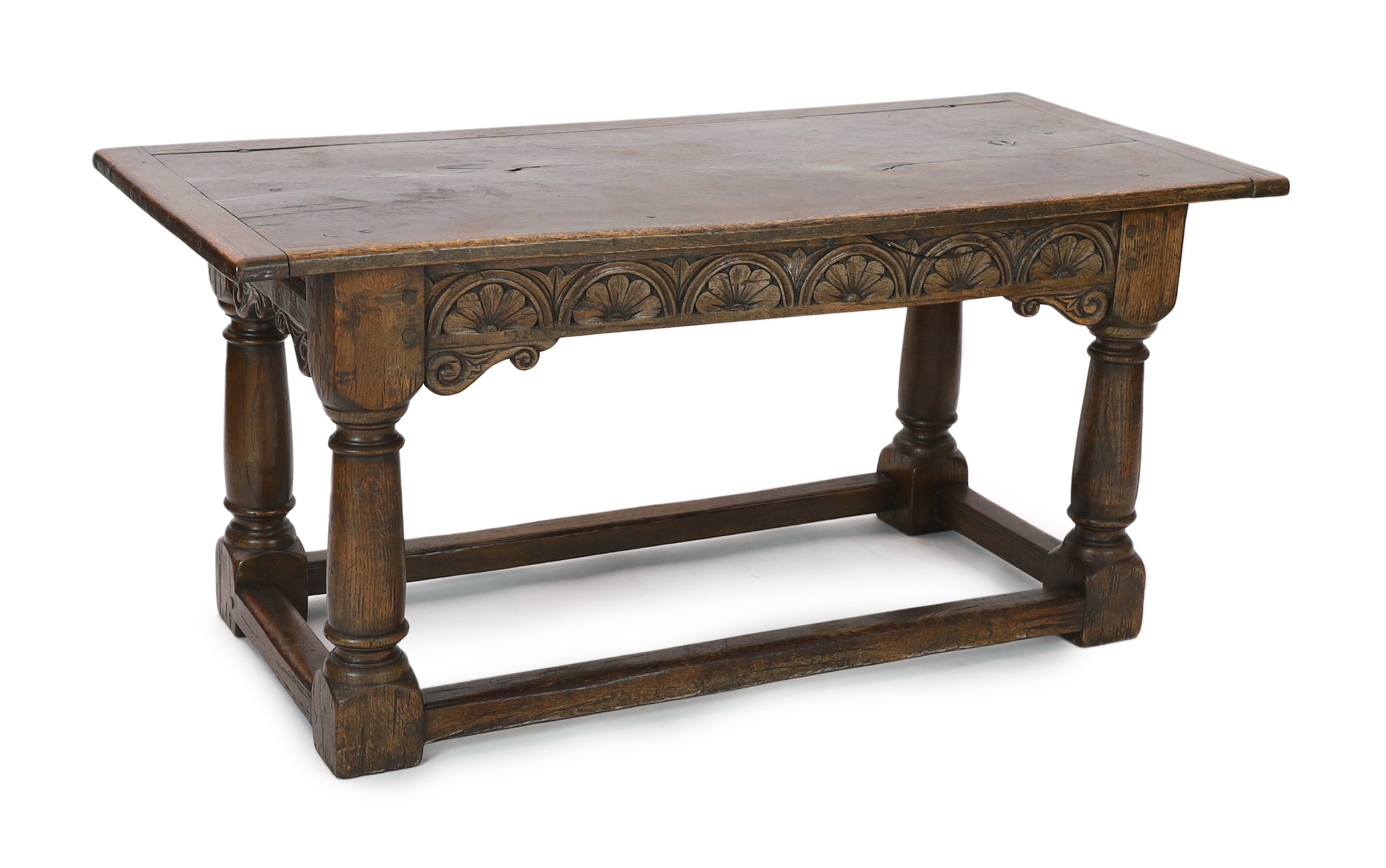 A 17th century style oak refectory table, width 167cm, depth 77cm, height 77cm